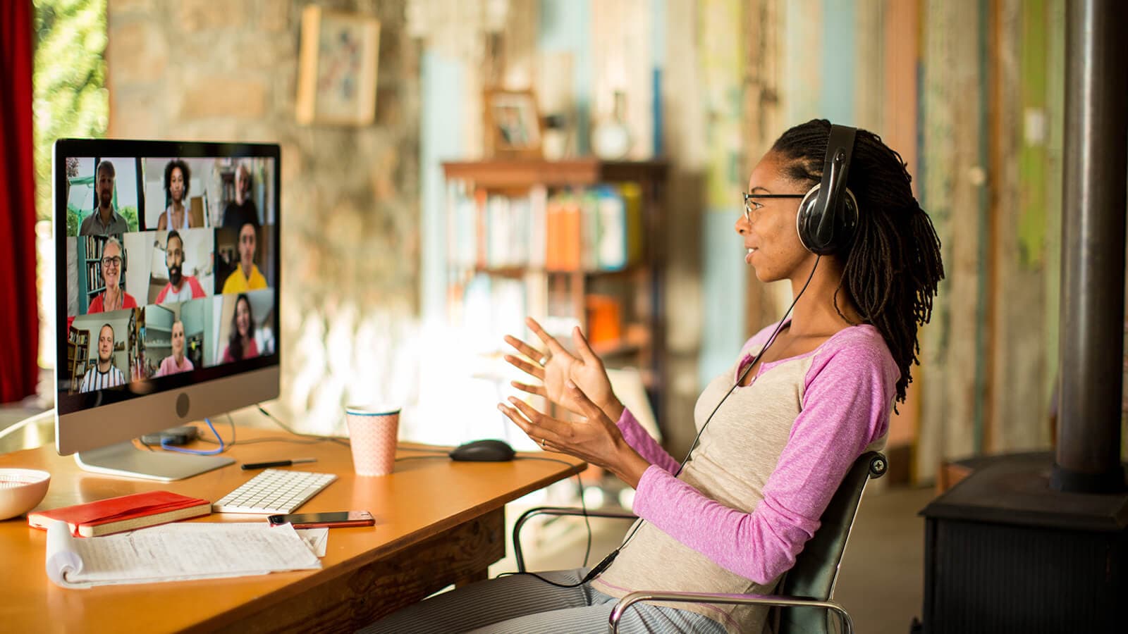 African-american woman talking at a webinar event.