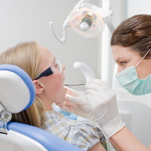 A dentist and a patient.